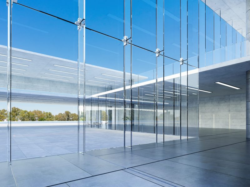 Modern glass wall commercial buildings lobby hall. Realistic 3d rendering